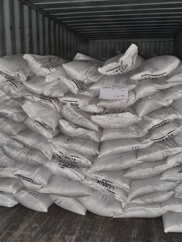 Pumice bags stacked to the roof, 30% of the load in place